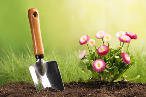 Low-maintenance landscape gardening in Chingford with outdoor seating